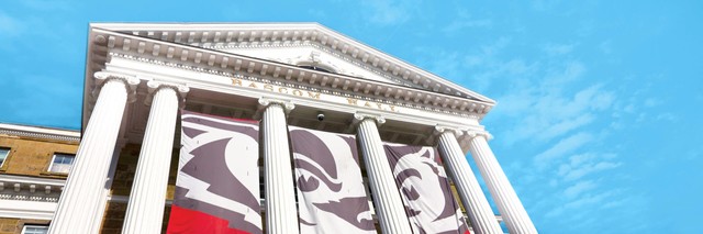 Bascom Hall with banners featuring Bucky Badger