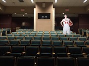 Cut-out of Frank Kaminsky in a lecture hall.