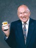 Donald Goerke MBA’51 holding a can of his creation &quot;SpaghettiOs&quot;