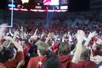 fans storming the field at Camp Randall