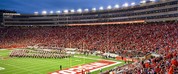 Camp Randall with the band on the field and fans in the stands