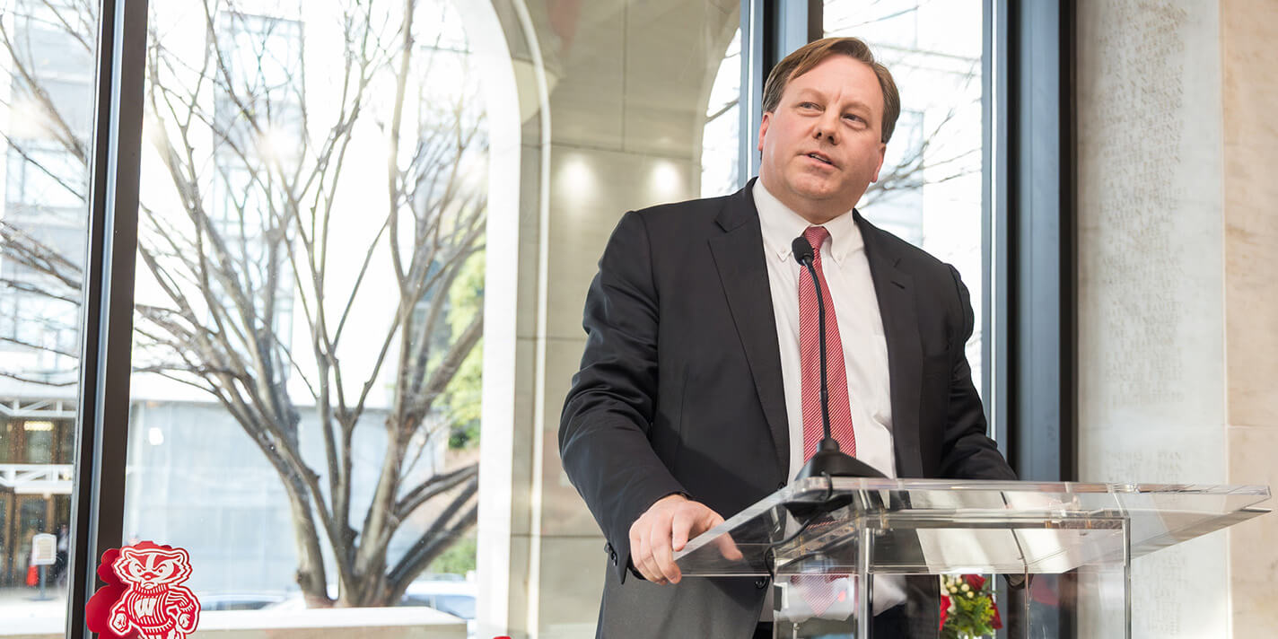 Undersecretary of War, and UW grad Michael Duffey speaks to alumni and friends at a reception during UW-Madison Day in Washington DC