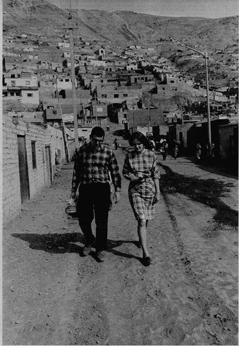 Lou and Lynne Santangelo live and teach in a slum neighborhood on hills edging Lima, Peru. May 1969