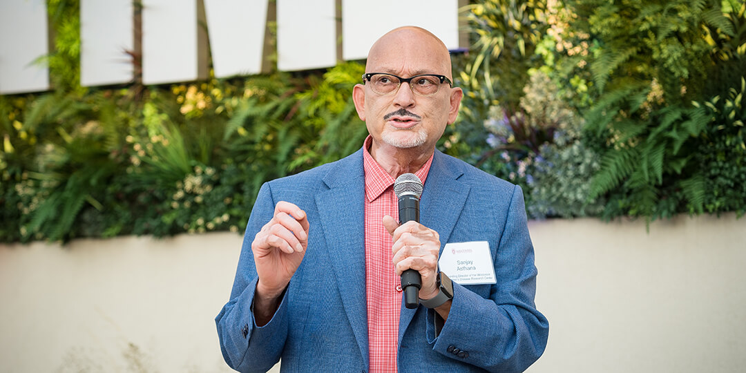 Dr. Sanjay Asthana discusses his research with the Buckingham Club of the Twin Cities.