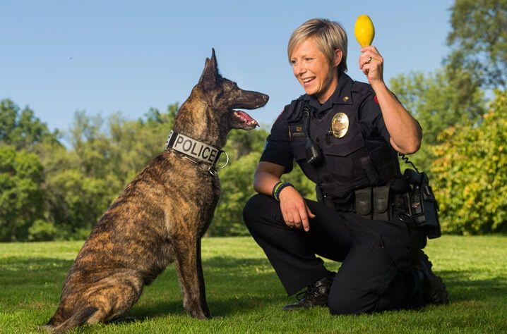 Photo of Sergeant Caradine and Casey. Photo by Andy Manis