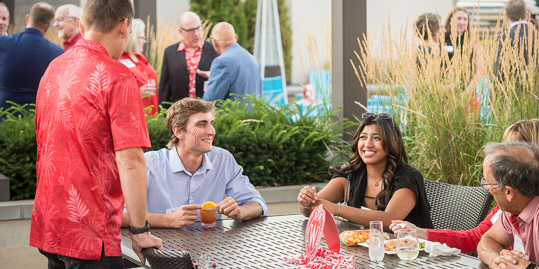 Guests mingle at the Buckingham Club's summer gathering.