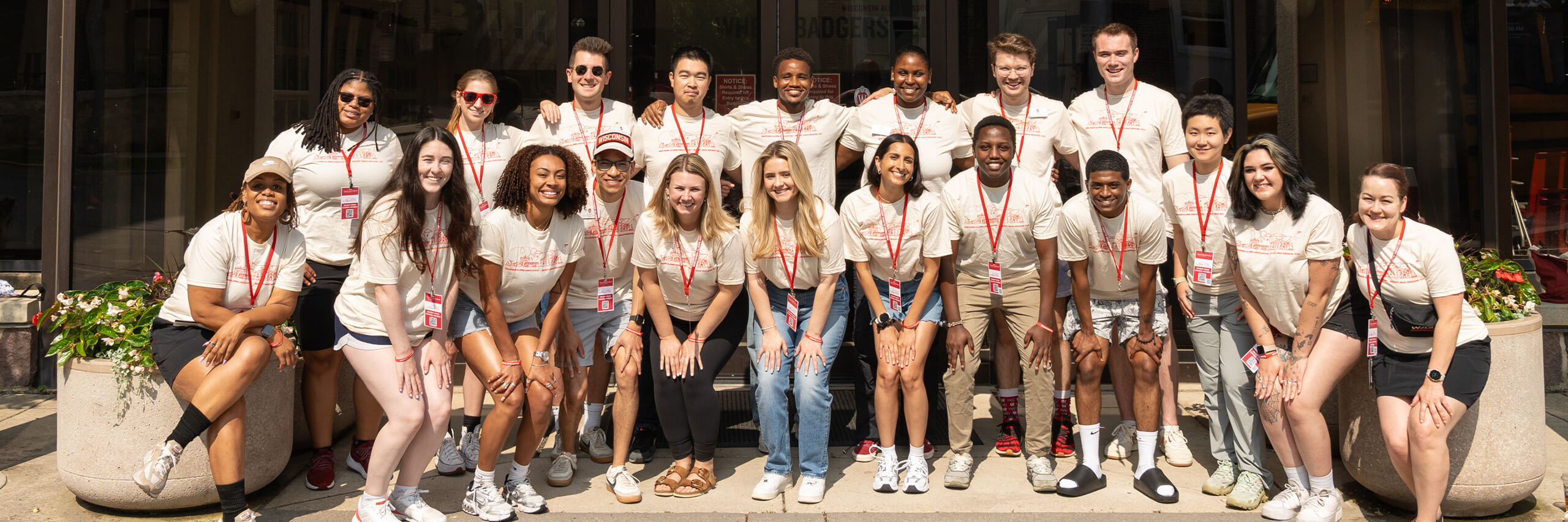 Recent-grads show outside of One Alumni Place