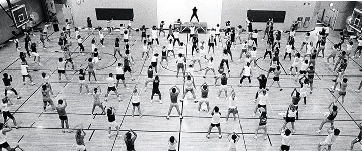 Black and white photo of a UW exercise class.