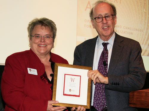 WAA President and CEO Paula Bonner MS'78 with 2011 DAA winner Stephen Roach. Photo by Paula McDermid.