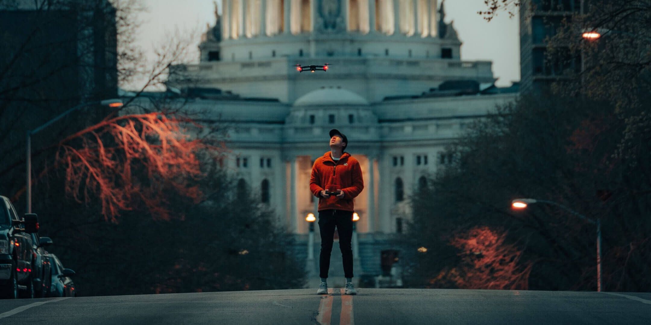 Sam Li '18 in the foreground of a great Capitol view.