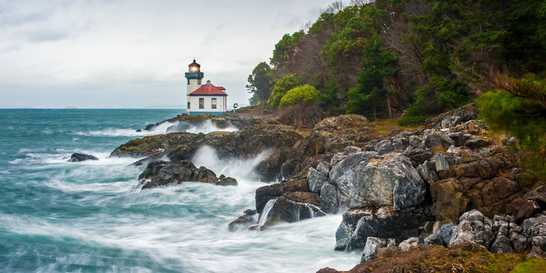 Small lighthouse on a rocky shore