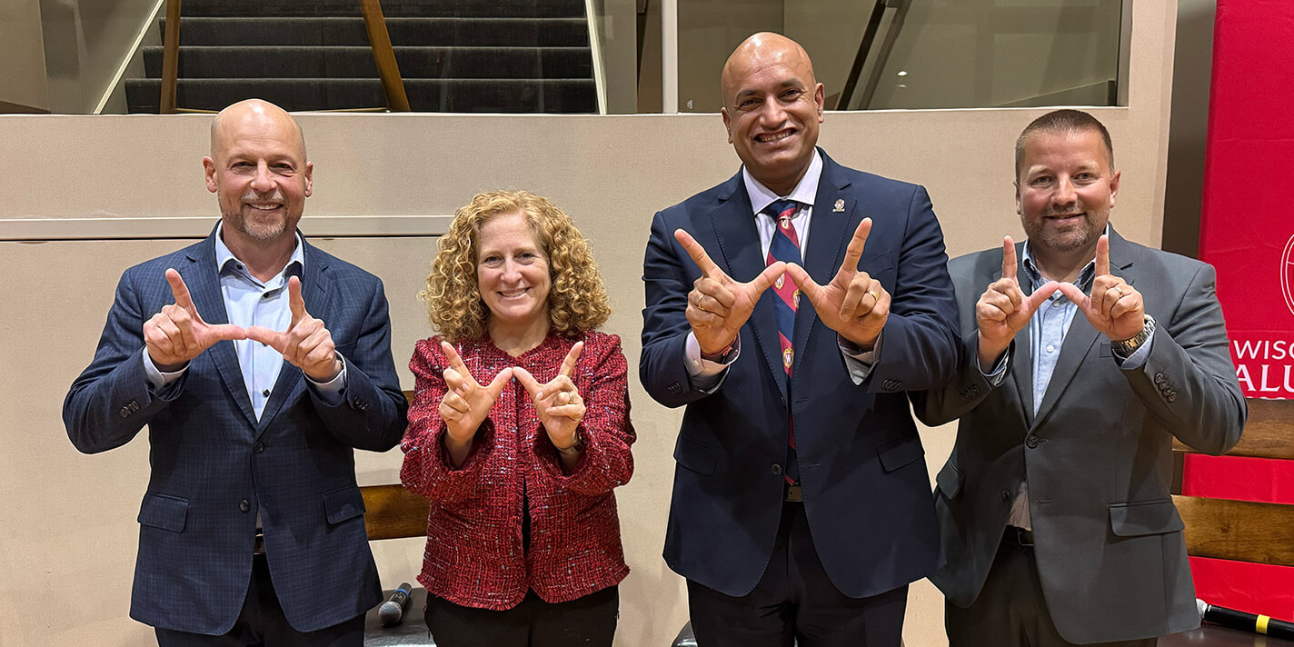 Left to right John Pfeiffer (President and CEO of Oshkosh Corporation), Jennifer Mnookin ( University of Wisconsin – Madison Chancellor), Devesh Ranjan ( Grainger Dean of the College of Engineering at the University of Wisconsin – Madison), and Scott Manley (Executive Vice President of Government Relations for Wisconsin Manufacturers and Commerce)