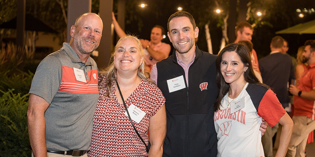 Local guests gather for a rooftop celebration.