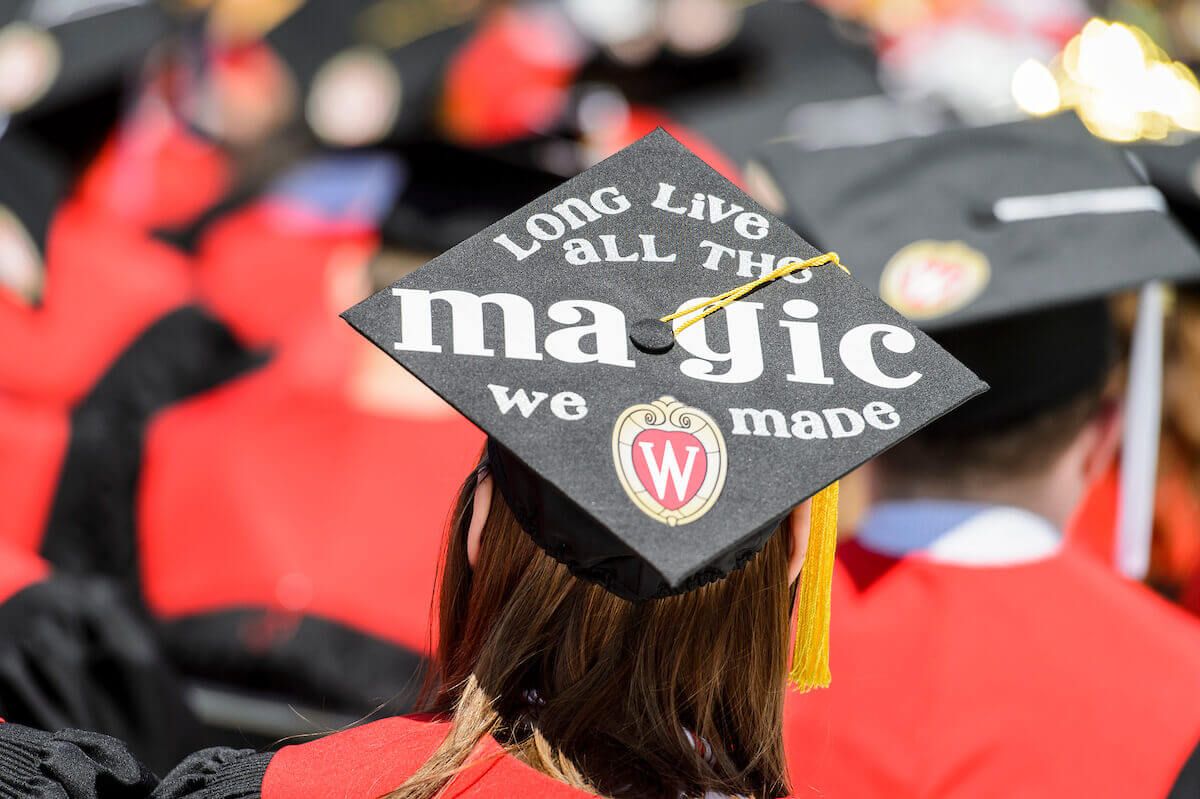 "Long live al the magic we made" message on a graduation cap